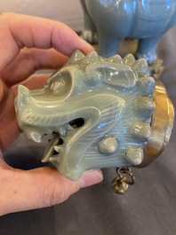 Een Chinese Longquan celadon wierookbrander in de vorm van een luduan met vergulde bronzen montuur, Ming