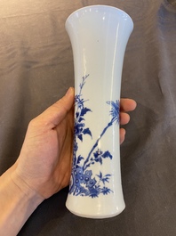 A Chinese blue and white vase with birds in a blossoming setting, Transitional period