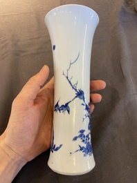 A Chinese blue and white vase with birds in a blossoming setting, Transitional period