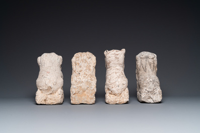 Four Chinese carved stone lions, possibly Tang