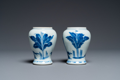 A pair of Chinese blue and white small vases with ladies, Kangxi
