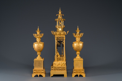 An impressive three-piece gilt bronze chinoiserie clock garniture, France, 19th C.