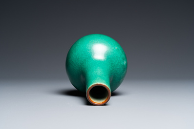 A Chinese monochrome apple green-glazed bottle vase, Qing