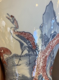 A Chinese blue, white and copper-red 'meiping' vase with cranes, Yongzheng mark, 19/20th C.