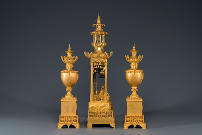 An impressive three-piece gilt bronze chinoiserie clock garniture, France, 19th C.