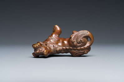 Poids de rouleau en bronze en forme de lion bouddhiste, Chine, Qing