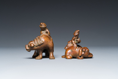 Two Chinese bronze scroll weights with Sogdian riders on a Buddhist lion and an elephant, Qing