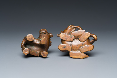 Two Chinese bronze scroll weights with Sogdian riders on a Buddhist lion and an elephant, Qing