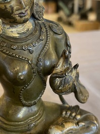 A Sino-Tibetan gilt bronze Tara, 17/18th C.