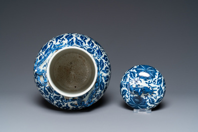 A pair of Chinese famille verte double gourd vases and a blue and white vase and cover, 19/20th C.