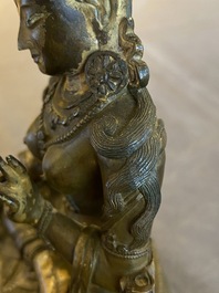 A Sino-Tibetan gilt bronze Tara, 17/18th C.