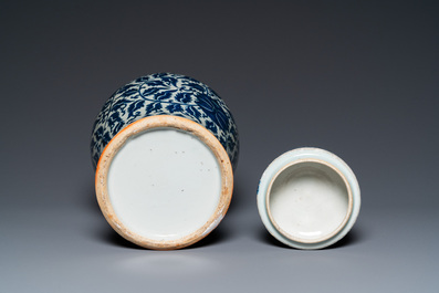 A pair of Chinese famille verte double gourd vases and a blue and white vase and cover, 19/20th C.