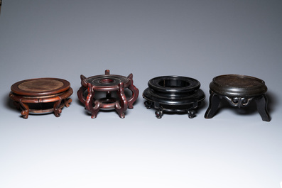 A varied collection of Chinese wooden stands, 19/20th C.