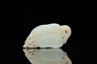 A Chinese 'twin cat' carved jade pendant, Qing