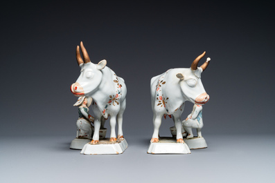 A pair of cold-painted white Dutch Delft cow milkers' groups, 18th C.