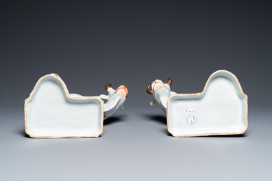 A pair of cold-painted white Dutch Delft cow milkers' groups, 18th C.