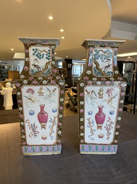 A pair of rectangular Chinese famille rose relief-molded vases, 19th C.