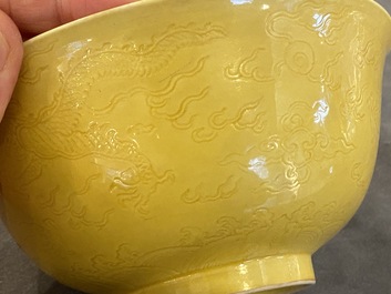 A Chinese monochrome yellow-glazed bowl with anhua dragon design, Qianlong mark but probably later