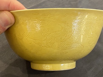 A Chinese monochrome yellow-glazed bowl with anhua dragon design, Qianlong mark but probably later