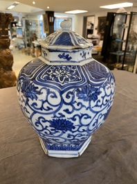 A Chinese hexagonal blue and white 'lotus scroll' vase and cover, Wanli