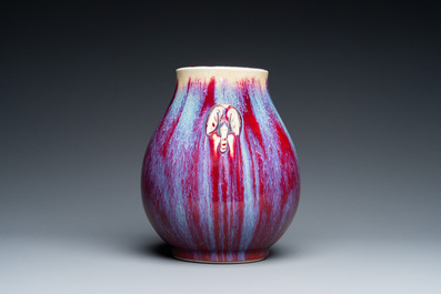 A Chinese flamb&eacute;-glazed 'hu' vase, 19/20th C.