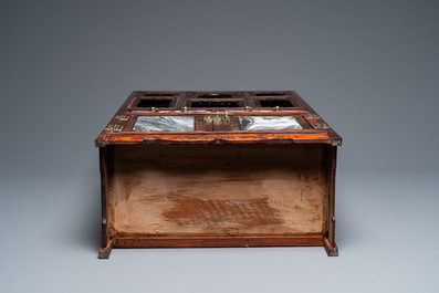 A small Chinese open-worked carved wooden cabinet with marble insets, 19th C.