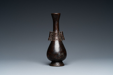 A Chinese bronze 'arrow' vase, Yuan