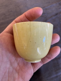 A Chinese monochrome yellow-glazed cup, Kangxi mark and of the period