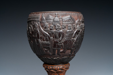 A Spanish colonial carved corozo and coconut marriage cup, probably Cuzco, Peru, 17th C.