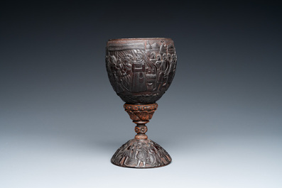 A Spanish colonial carved corozo and coconut marriage cup, probably Cuzco, Peru, 17th C.