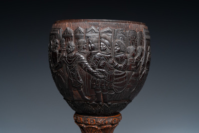 A Spanish colonial carved corozo and coconut marriage cup, probably Cuzco, Peru, 17th C.