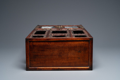 A small Chinese open-worked carved wooden cabinet with marble insets, 19th C.