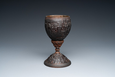 A Spanish colonial carved corozo and coconut marriage cup, probably Cuzco, Peru, 17th C.