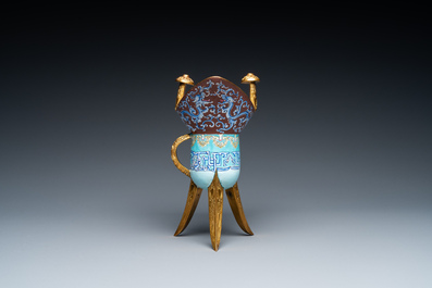 A Chinese Canton enamel and gilt bronze ritual wine vessel or 'jue' on wooden stand, 18/19th C.