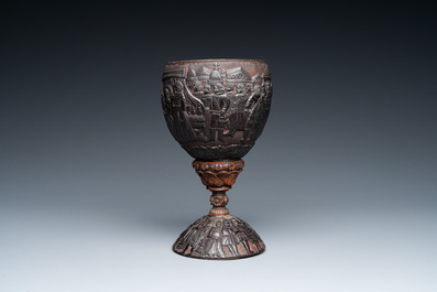 A Spanish colonial carved corozo and coconut marriage cup, probably Cuzco, Peru, 17th C.