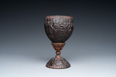 A Spanish colonial carved corozo and coconut marriage cup, probably Cuzco, Peru, 17th C.