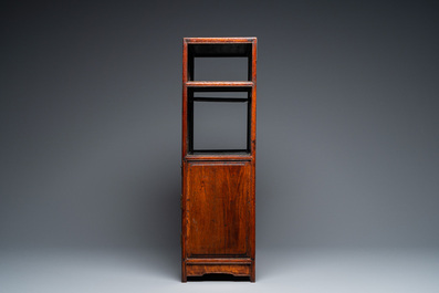 A small Chinese open-worked carved wooden cabinet with marble insets, 19th C.