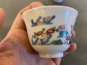 A pair of Chinese famille verte 'grasshopper' teacups, Kangxi mark but probably laer