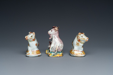 Three polychrome and cold-painted Dutch Delft miniatures of a buckrider and two cows, 18th C.