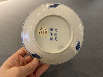 A Chinese blue and white 'lotus scroll' plate, Guangxu mark and of the period