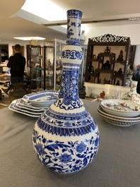 A Chinese blue and white bottle vase with floral design, Kangxi