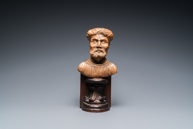 An Italian alabaster bust of a bearded man on a later wooden stand, 16th C.