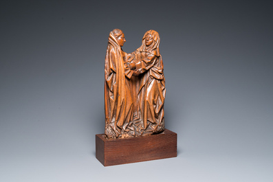 A Flemish carved oak retable fragment depicting 'The Visitation', 16th C.