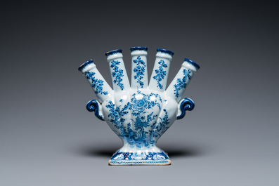 A Dutch Delft blue and white tulip vase with floral design, 18th C.