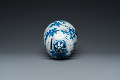 An exceptional Dutch Delft blue and white triple gourd money bank, early 18th C.