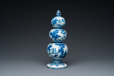 An exceptional Dutch Delft blue and white triple gourd money bank, early 18th C.