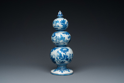 An exceptional Dutch Delft blue and white triple gourd money bank, early 18th C.