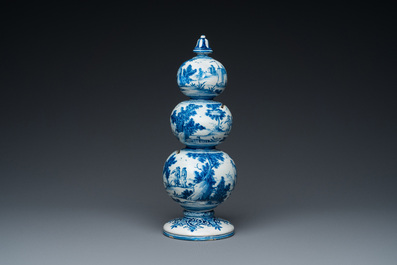 An exceptional Dutch Delft blue and white triple gourd money bank, early 18th C.