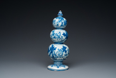 An exceptional Dutch Delft blue and white triple gourd money bank, early 18th C.