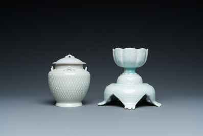 A Chinese carved qingbai vase with cover and a cup with stand, Song or later